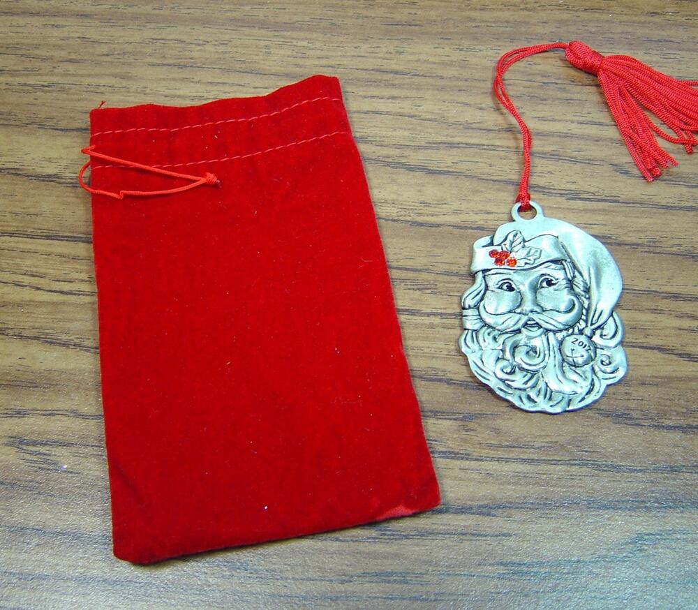 AVON PEWTER ORNAMENT-SANTA CLAUS WITH RED RHINESTONE ACCENTS-2012-RED VELVET BAG